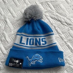 New Era NFL Detroit Lions Blue and Gray Beanie w/ removable Pom.